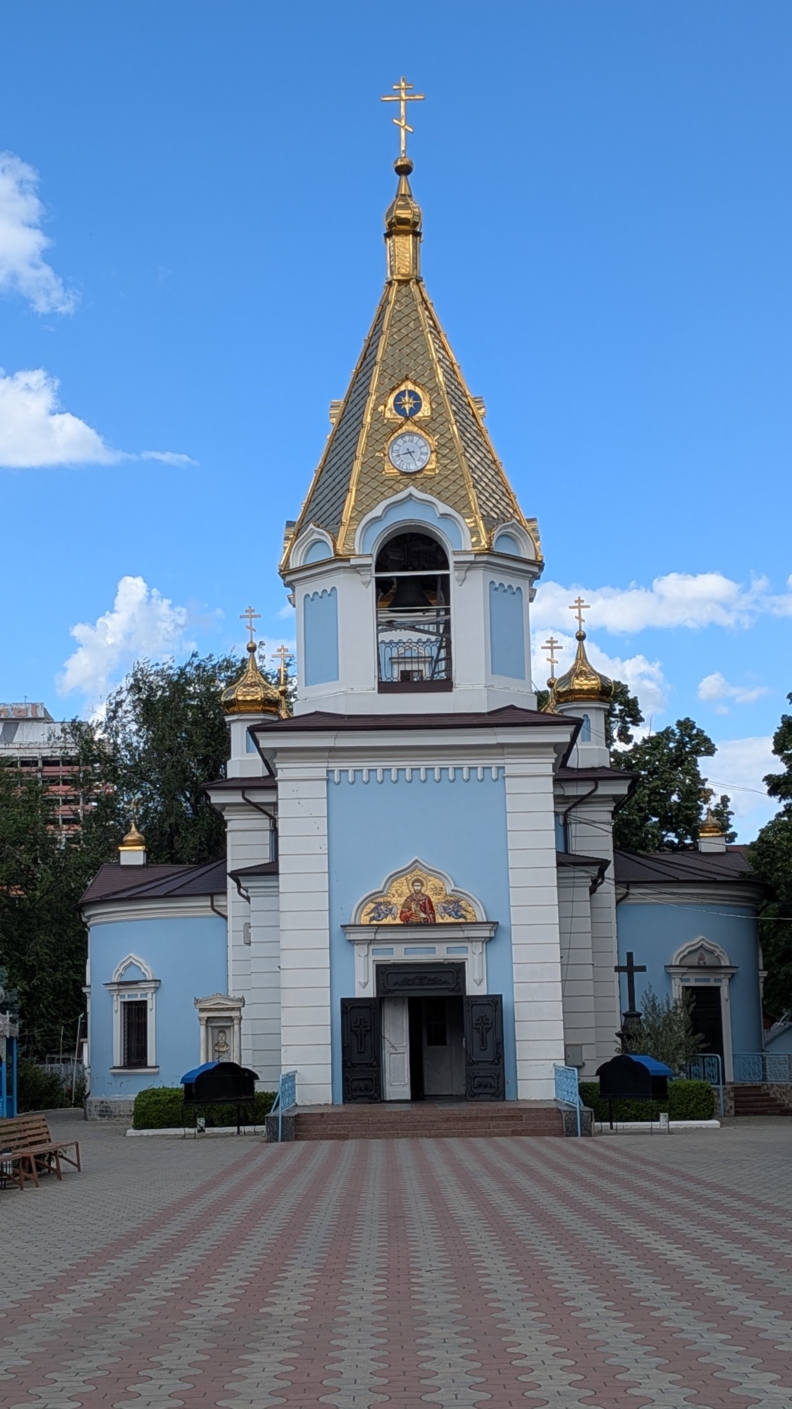 Ciuflea Monastery in Chisinau with its blue walls and golden domes topped with Orthodox crosses